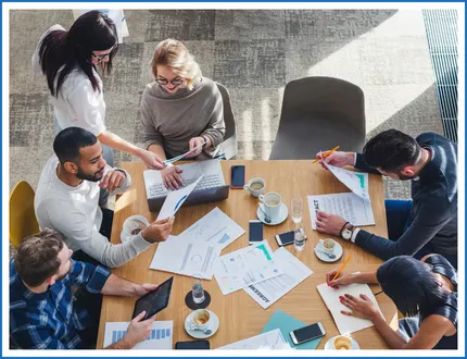 Team collaborating around a table